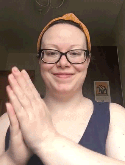 A person clapping their hands