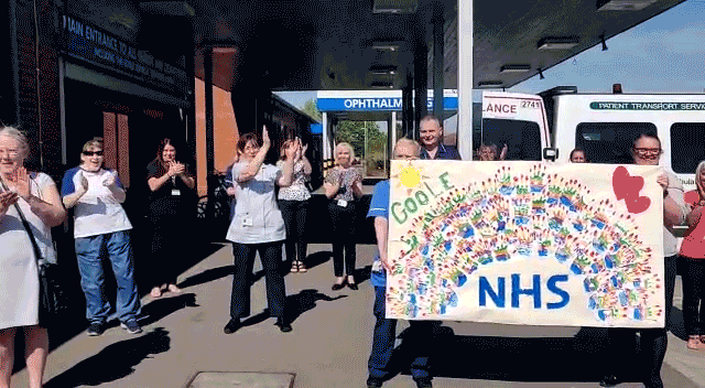 Short video of carers clapping outside a hospital